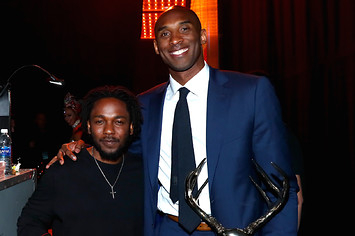 Kendrick Lamar (L) and Athlete of the Decade honoree Kobe Bryant