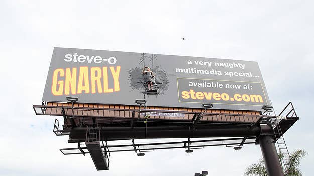 Steve-O of 'Jackass' and 'Wildboyz' fame attached himself to a billboard in Los Angeles with duct tape to promote his new comedy special 'Gnarly.'