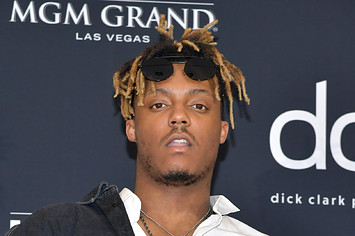 Juice Wrld poses with the award for Best New Artist