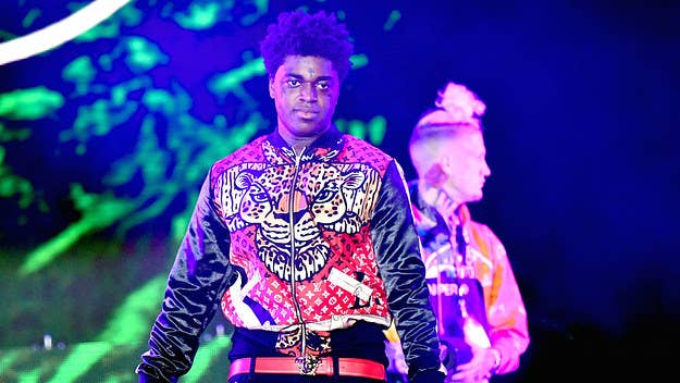 Kodak might be behind bars, but that didn't stop his lawyer from drafting up legal papers against Walmart for selling fake Sniper Gang chains. 