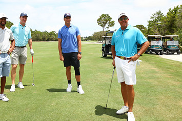 Tiger Woods, Peyton Manning, Tom Brady, and Phil Mickelson