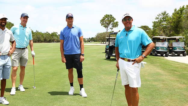 Two of the biggest rivalries in sports came together Sunday, as Peyton Manning and Tom Brady, as well as Tiger Woods and Phil Mickelson hit the links.