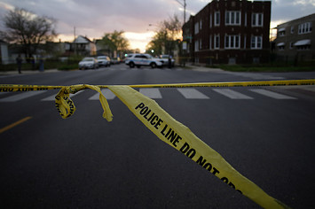 Chicago Police crime tape is displayed at the scene