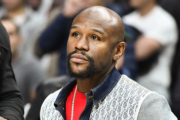 Floyd Mayweather Jr. attends a basketball game
