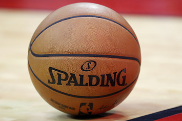 A Spalding basketball is seen on the court