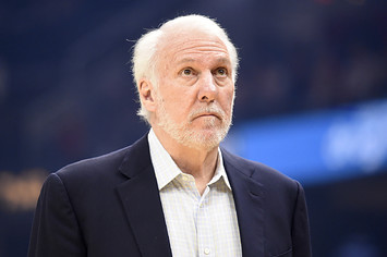 Gregg Popovich watches the scoreboard during first half against the Cavaliers.