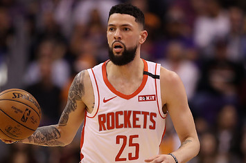 Austin Rivers of the Houston Rockets handles the ball against the Phoenix Suns.