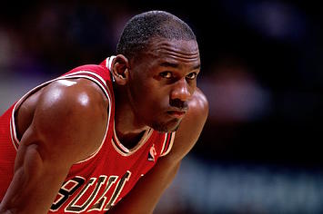 Michael Jordan #23 of the Chicago Bulls looks on durng a NBA game.