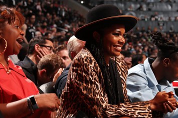 Gabrielle Union sits courtside at a Heat game.