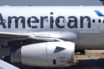 American Airlines passenger aircraft parked at gate at Ronald Reagan Washington National Airport.