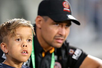 Quaden Bayles looks on with Cody Walker of the Indigenous All Stars