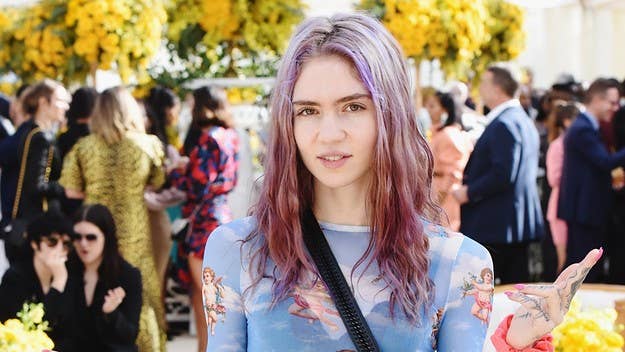 Grimes doesn't actually think global warming "is good," you goobers.