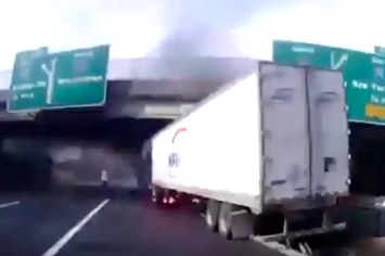 Screenshot from body cam footage of NJ State Trooper saving trucker.