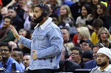 Drake dances during the first half of an NBA game between the Suns and Raptors.