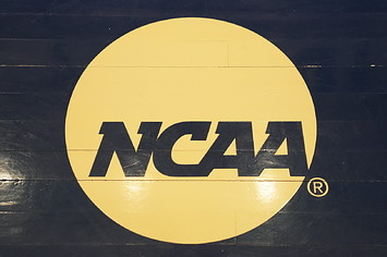 The NCAA logo on the floor during a Atlantic 10 Women's Basketball Tournament.