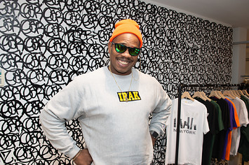 Kunle F. Martins, Aka Earsnot, at his IRAK Installation in Dover Street Market New York