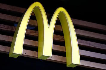 A logo of McDonalds is pictured above a branch of the fast food restaurant in central London.