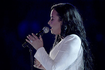Demi Lovato performs onstage during the 62nd Annual GRAMMY Awards.