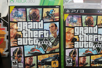 Copies of Grand Theft Auto V are displayed at the 8 Bit & Up video games shop.