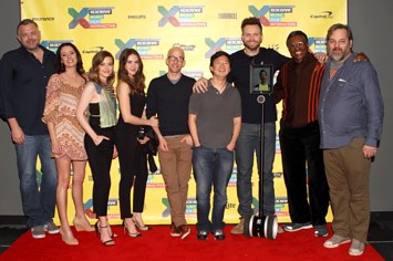 The cast of 'Community' poses on the red carpet.