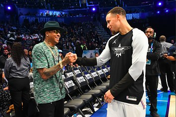 Stephen Curry #30 of Team Giannis shakes hands with Allen Iverson