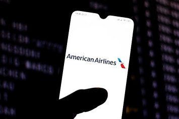 American Airlines logo is seen displayed on a smartphone.