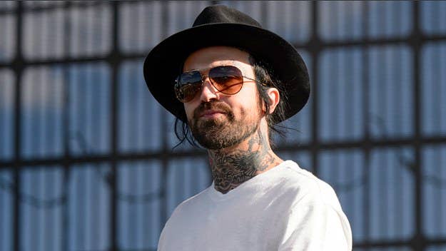 Yelawolf details how Kid Rock's feature on 2011's "Let's Roll" caused issues between him and Eminem.
