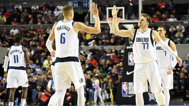 Dallas Mavericks teammates Luka Doncic and Kristaps Porzingis tried to recreate the shot during Thursday's game against the Detroit Pistons in Mexico City.