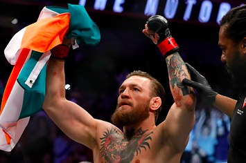 Conor McGregor celebrates after defeating Donald Cerrone