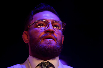 UFC fighter Conor McGregor watches his team mate, Kiefer Crosbie