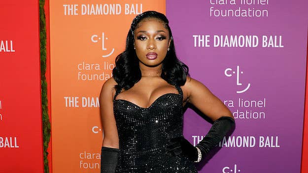 Megan Thee Stallion hit back at a hater who linked her mother's death to the devil.