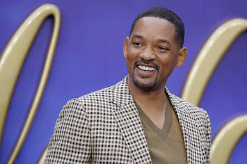 Will Smith poses on arrival for the European Gala of "Aladdin."