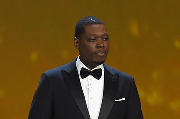 Michael Che speaks onstage during the 70th Emmy Awards