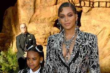Blue Ivy Carter and Beyoncé attends the premiere of Disney's "The Lion King"