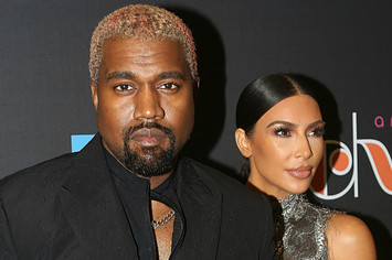 Kanye West and Kim Kardashian West pose