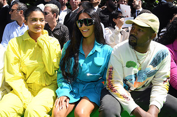 Kylie Jenner, Kim Kardashian and Kanye West attend Louis Vuitton Menswear show.