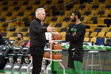 Danny Ainge and Kyrie Irving talk before the game against the Utah Jazz.