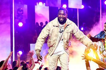 Meek Mill and DJ Khaled perform onstage at the 2019 BET Awards