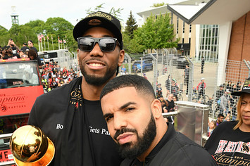Kawhi Leonard #2 of the Toronto Raptors poses for a photograph with Rapper, Drake