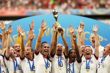 Carli Lloyd of the USA lifts the FIFA Women's World Cup Trophy