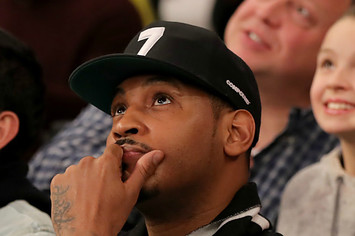 Former New York Knicks Carmelo Anthony attends the game
