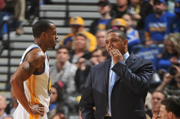 Head Coach Mark Jackson of the Golden State Warriors coaches player Andre Iguodala