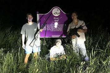 Ole Miss fraternity students pose in front of Emmett Till memorial sign