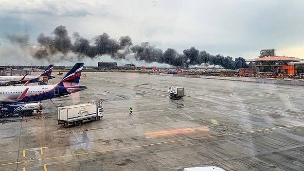 A Russian plane carrying 78 passengers burst into flames after an emergency landing at a Moscow airport.