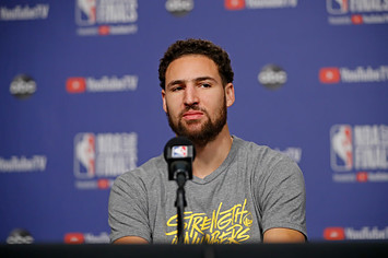 Klay Thompson #11 of the Golden State Warriors answers questions