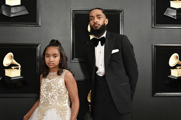 Emani Asghedom and Nipsey Hussle attend the 61st Annual Grammy Awards
