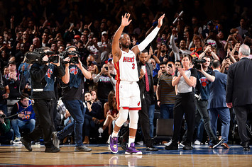 Dwyane Wade #3 of the Miami Heat gestures to the crowd