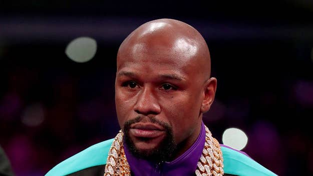50 Cent used the footage of a woman in the Philippines calling Floyd a "chicken" to troll the boxer.