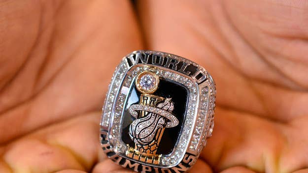 The rings were replicas from the NFL, MLB, and NBA. 