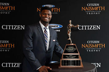 Zion Williamson poses with his Naismith Award